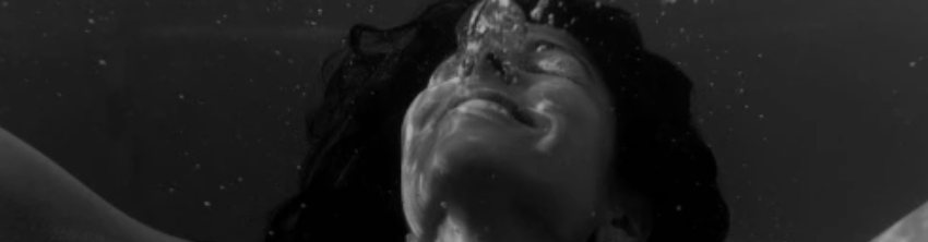 Black and white portrait looking upward
